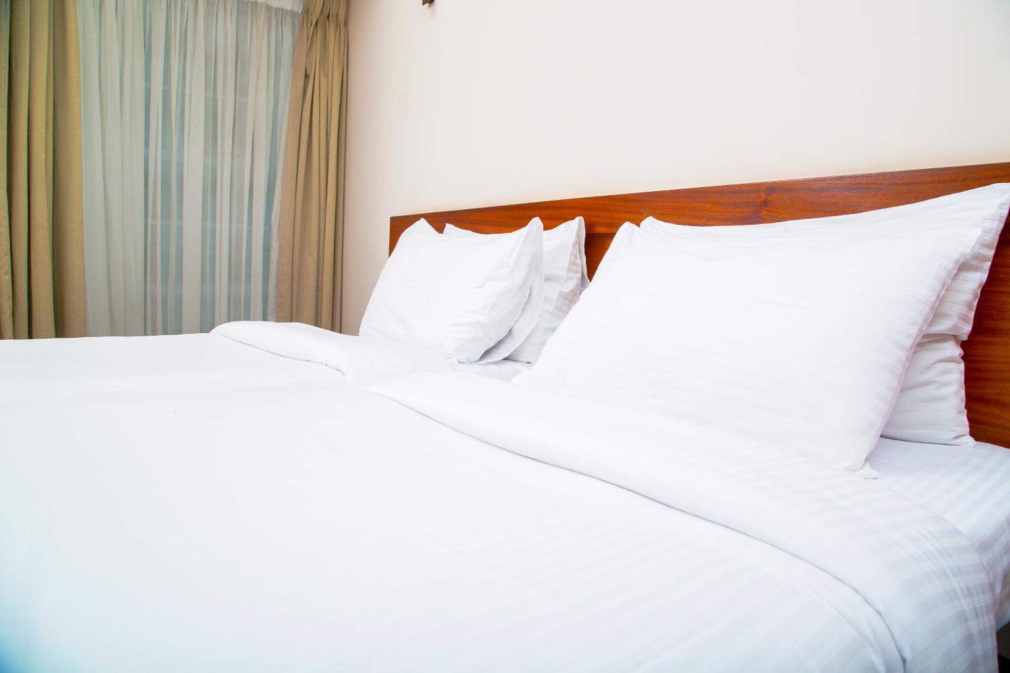 Batians Apartment Hotel Найроби Номер фото