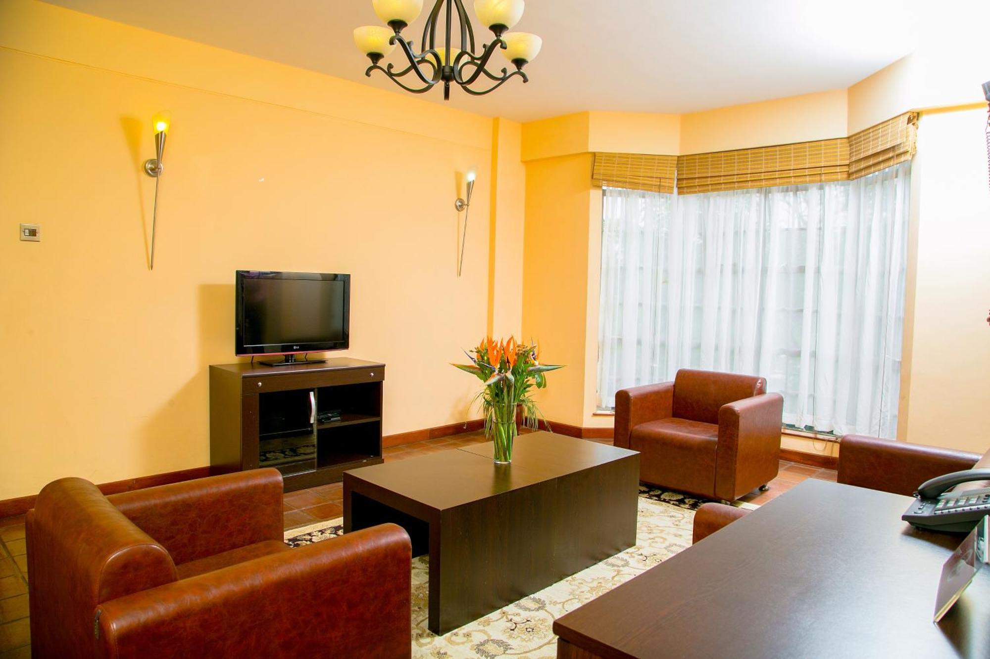 Batians Apartment Hotel Найроби Номер фото